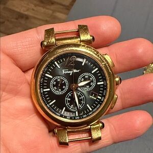 Salvatore Ferragamo Black Dial Gold Case Watch. NO STRAPS